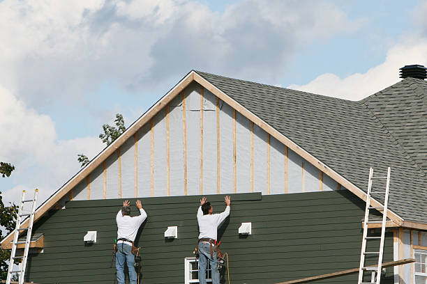 Professional Siding Contractor technician working in Dayton, OH
